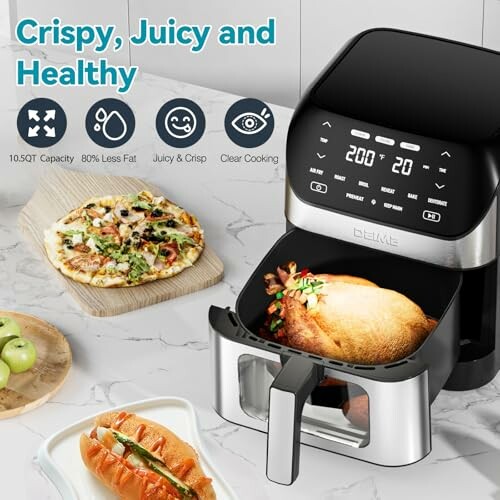 Air fryer with chicken and pizza, showcasing cooking features.