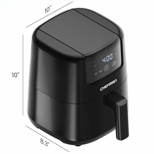 Black compact air fryer with digital display showing 400 degrees.