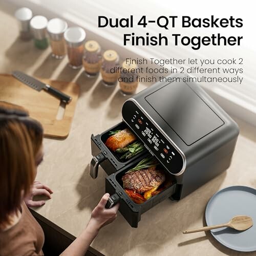 Dual basket air fryer with cooked food and timer display.