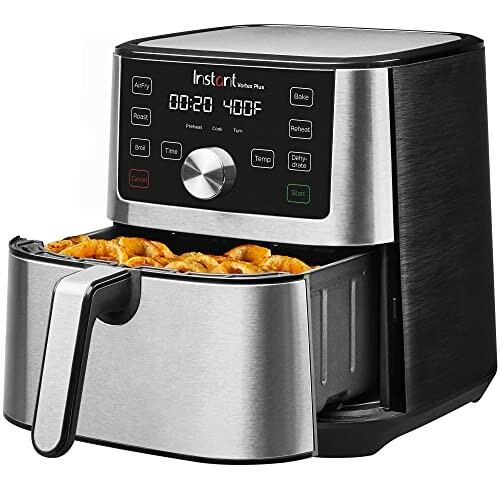 Instant Vortex Plus air fryer with digital display and open basket with food.