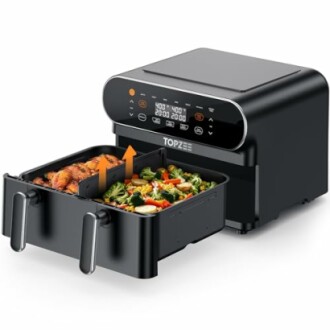 Black dual-basket air fryer with digital display and food inside.